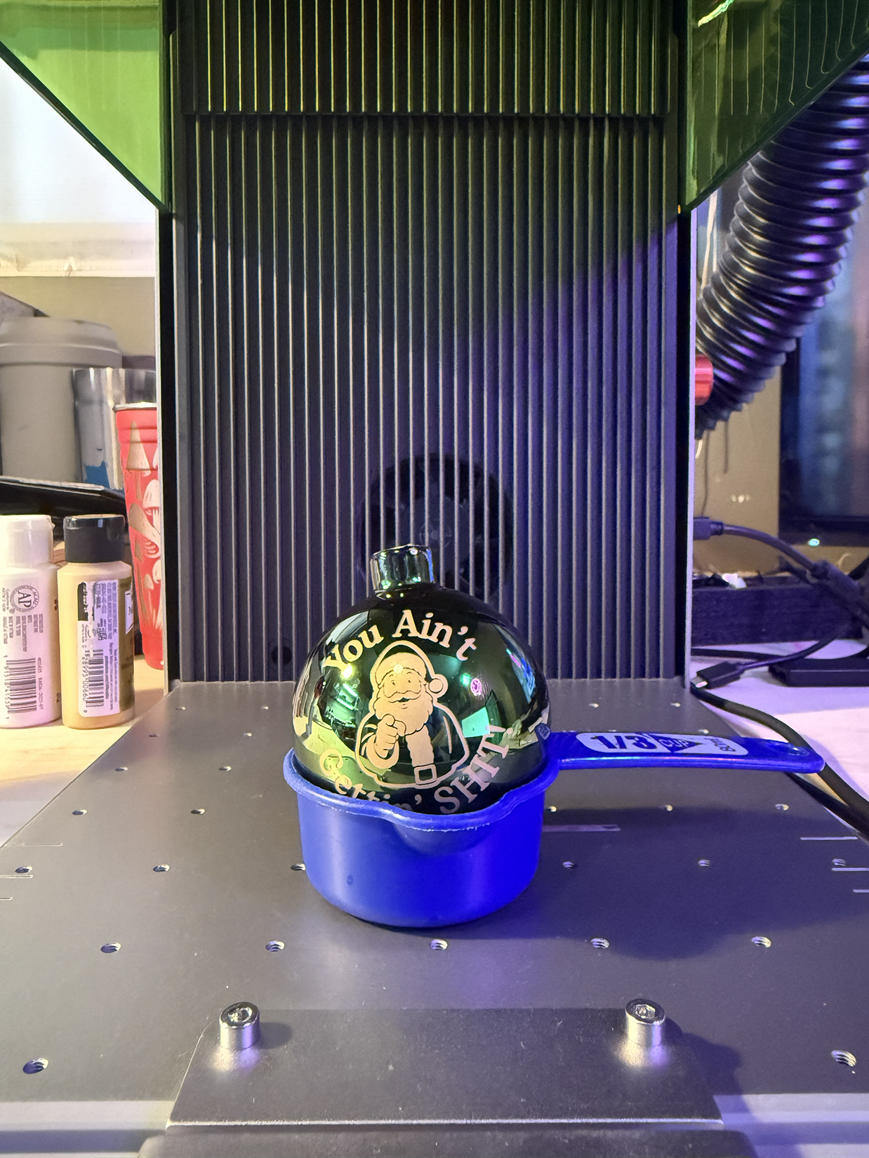 Laser engraved glass Christmas ornament with funny message